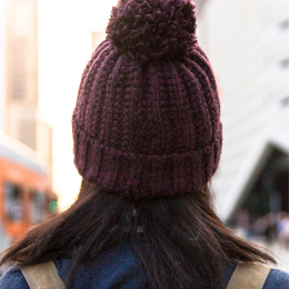 Knitted burgundy winter cap